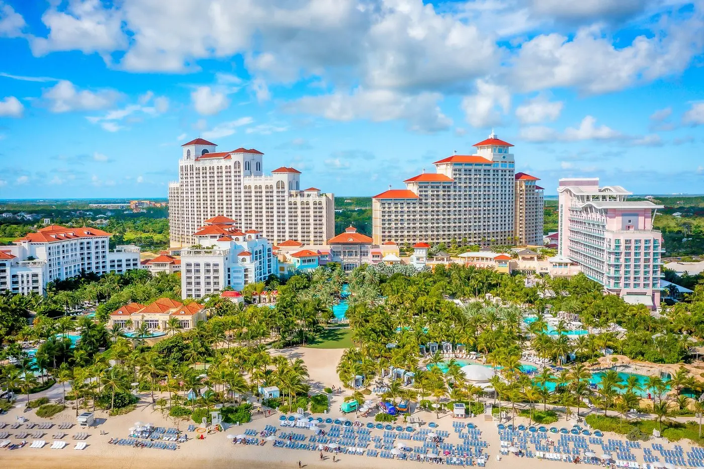 Panoramic shot of the Grand Hyatt Baha Mar resort in Nassau, featuring tropical gardens, beachfront pools, and luxury towers.