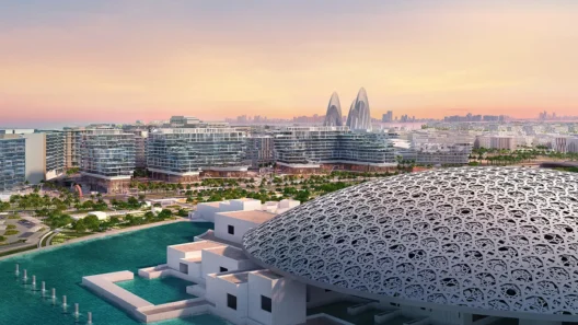 A spectacular sunset over Louvre Abu Dhabi and the skyline of Saadiyat Island, blending art, nature, and modernity.