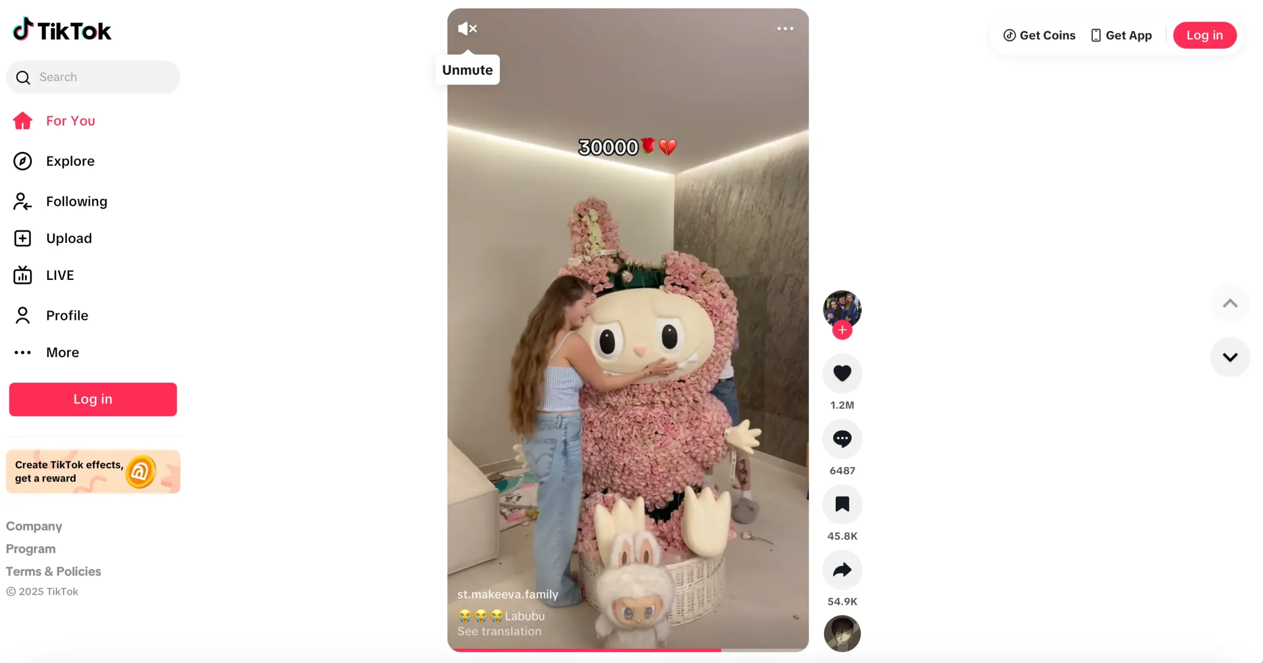 A young girl hugs a large pink Labubu character made of flowers in a TikTok video with over 1.2 million likes, highlighting the app’s viral kid-focused content.
