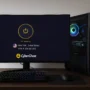 High-end gaming PC setup with an ultrawide monitor, RGB lighting, and CyberGhost VPN running in the background – perfect for low-lag online gaming.