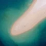 Aerial view of a stunning sandy beach with turquoise water on the Croatian coast, perfect example of Croatia’s most beautiful and unique beaches.