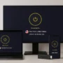 CyberGhost VPN setup displayed on a laptop screen with various devices nearby, illustrating multi-device compatibility in a real-life setting.