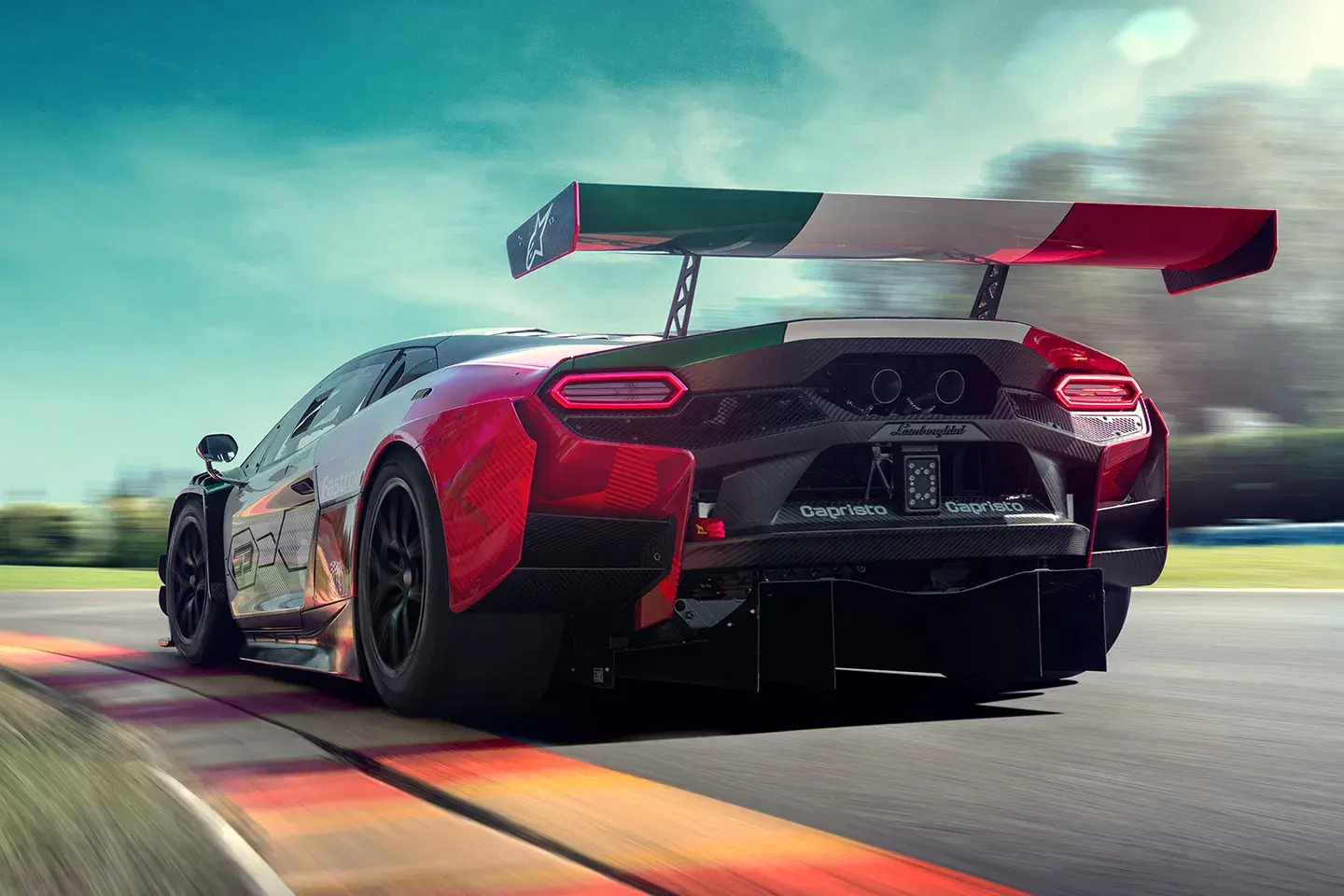 Rear view of the Lamborghini Temerario GT3 at high speed on track, showcasing its large diffuser and Italian flag rear wing.
