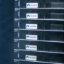 Close-up of NordVPN-branded physical servers in a secure data center, illustrating the company’s private server infrastructure.