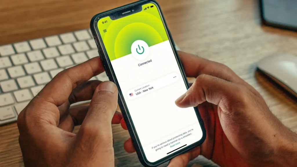 User connected to ExpressVPN on a smartphone, illustrating easy access to VPN protection across all pricing plans—Basic, Advanced, and Pro.