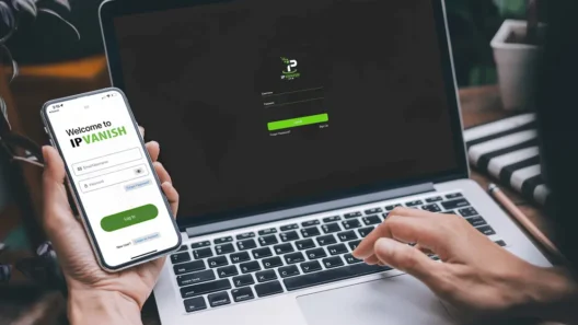 A person logging into IPVanish on both a smartphone and a laptop at the same time, illustrating the real benefit of unlimited device connections for families, small businesses, or anyone who wants VPN security on all their gadgets.