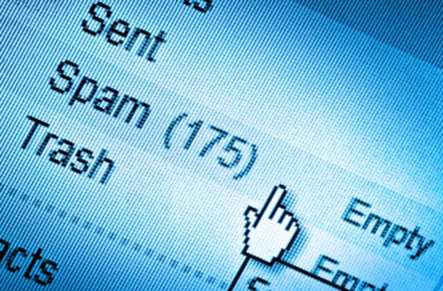 A digital screen with an email interface, focusing on the “Spam (175)” folder and a cursor hovering over the “Empty” button, ready to delete junk emails.