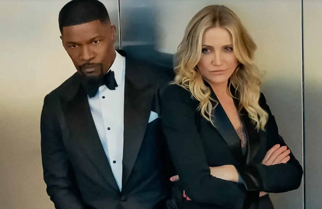 Back in Action 2025 | Venclikovi.com Jamie Foxx and Cameron Diaz dressed in black suits in Back in Action movie scene