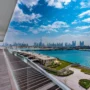 Luxury waterfront apartments in Dubai with panoramic skyline views of Downtown and Burj Khalifa.