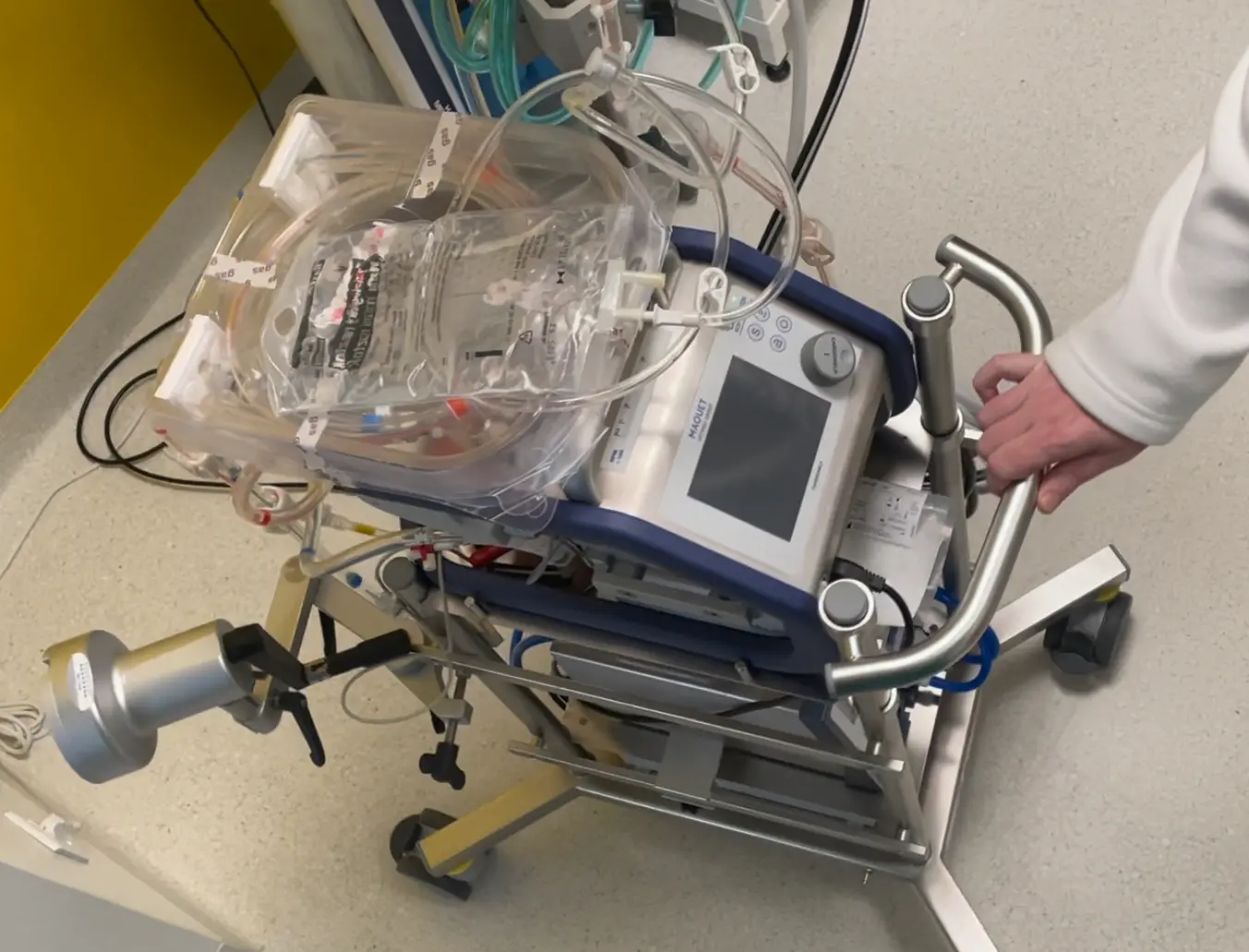 Close‑up of a Maquet ECMO machine used in a hospital for advanced heart and lung support.