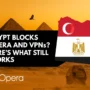 A bold digital image showing Egypt’s iconic pyramids and the Sphinx at sunset, with a black speech bubble that says “Egypt Blocks Opera and VPNs? Here’s What Still Works”. A map of Egypt filled with the national flag and Opera browser logo is placed on the right, while the Opera logo appears in the bottom-left corner.