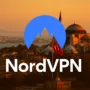 NordVPN logo centered over a warm sunset view of Istanbul, Turkey, featuring the Hagia Sophia and a Turkish flag, with golden light reflecting across the city skyline in a modern 16:9 promotional banner style.