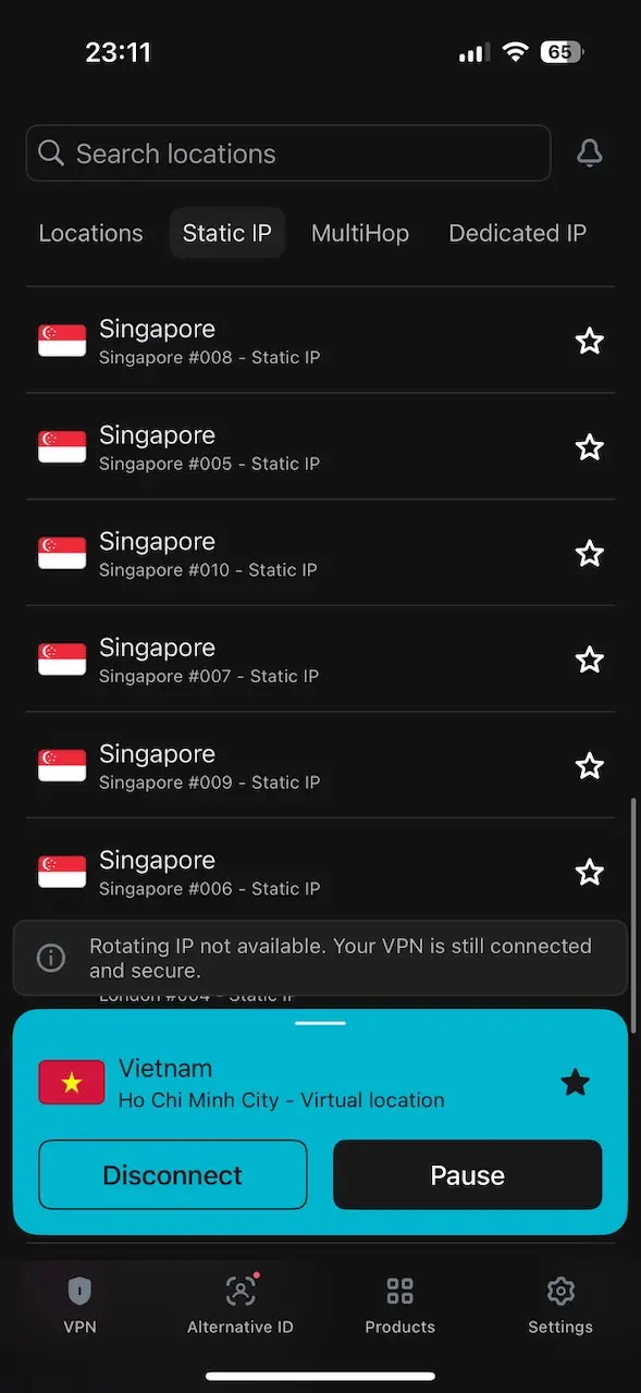 Surfshark VPN connected to Ho Chi Minh City virtual location on iPhone, showing Singapore static IP options and active secure connection screen.