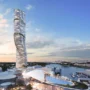 Modern luxury skyscraper hotel in Sydney with curved glass design overlooking the harbor and infinity pool at sunset
