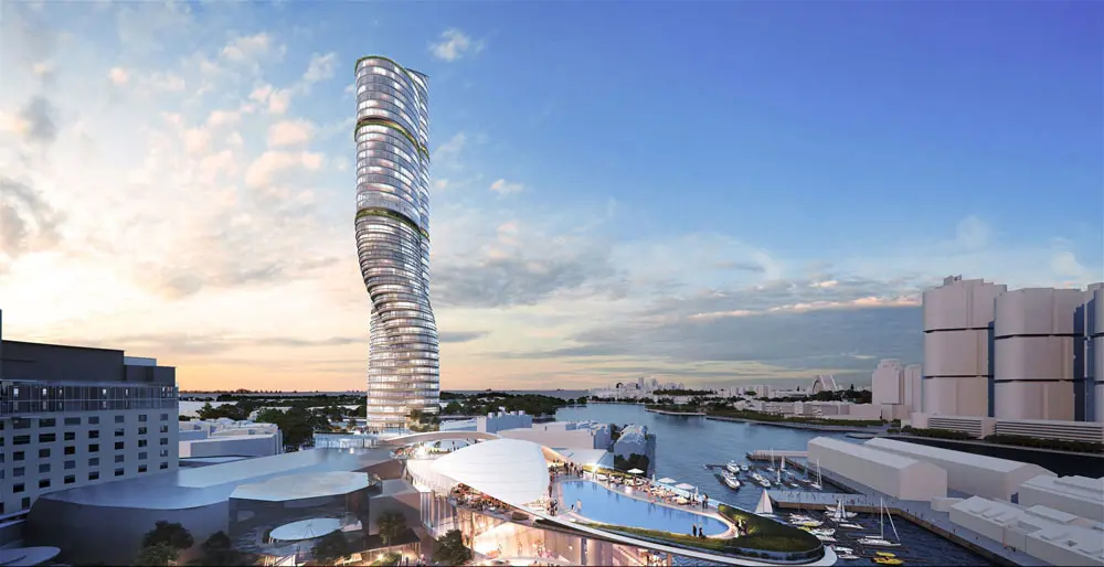 Modern luxury skyscraper hotel in Sydney with curved glass design overlooking the harbor and infinity pool at sunset