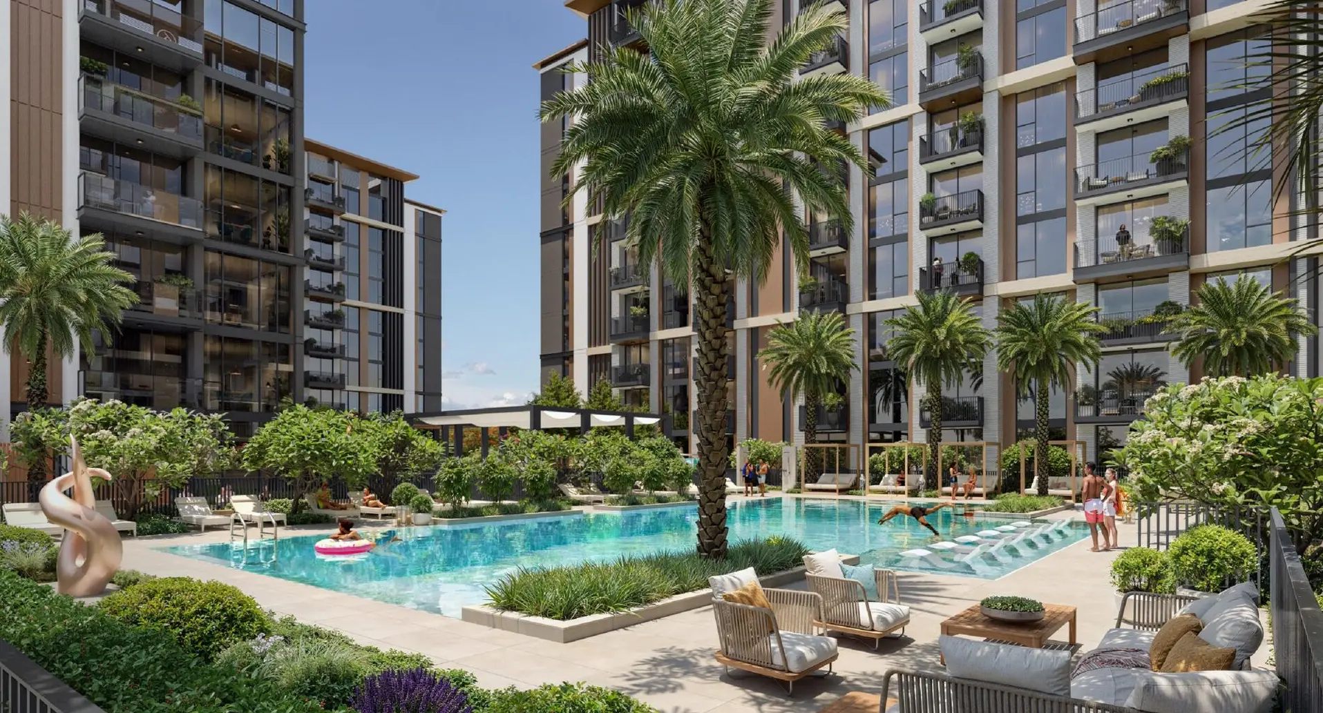 Family-friendly apartment complex in Dubai with landscaped gardens, palm trees, and a shared outdoor pool.