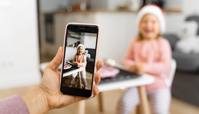 Taking a holiday photo of a little girl for social media cute now, but what happens to it later?