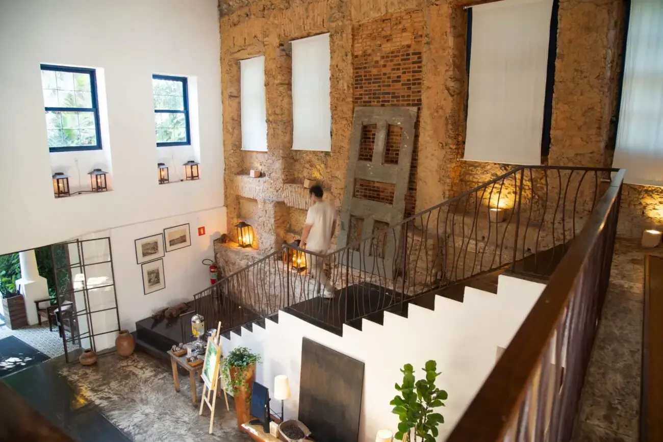 MGallery Santa Teresa - Rio de Janeiro - Brazil 3 | Venclikovi.com Rustic interior with stone walls and staircase at Santa Teresa Hotel