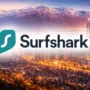 Surfshark logo over Santiago, Chile skyline with the Andes mountains in the background, representing VPN usage and online privacy in Chile.