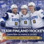 Team Finland men’s ice hockey players celebrating a goal together in white Suomi jerseys, symbolizing Finland’s national team at the Milano Cortina Winter Olympics 2026.
