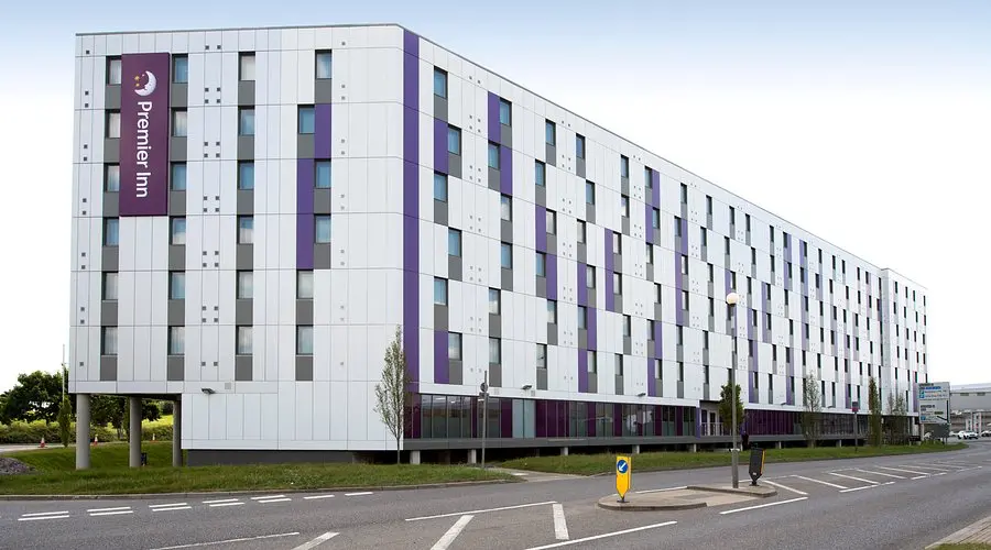 Premier Inn London Heathrow Airport Terminal 4 | Venclikovi.com The distinctive purple and white exterior of the Premier Inn London Heathrow Airport Terminal 4, the top-rated budget hotel connected to the terminal via a covered sky-bridge.