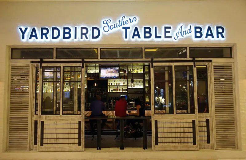 Yardbird Venetian | Venclikovi.com The entrance to Yardbird Southern Table and Bar, a top-rated pre-show dining spot for Southern comfort food near the pedestrian bridge.