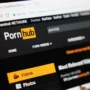 Close-up of Pornhub homepage on a browser, showing the site’s interface and secure connection status